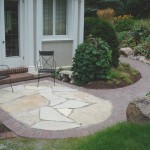 Flagstone inset into walkway to create patio space