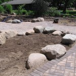 During installation placement of large boulders