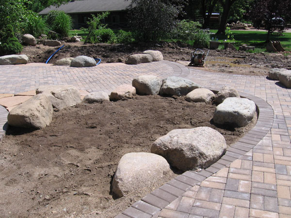 During installation placement of large boulders